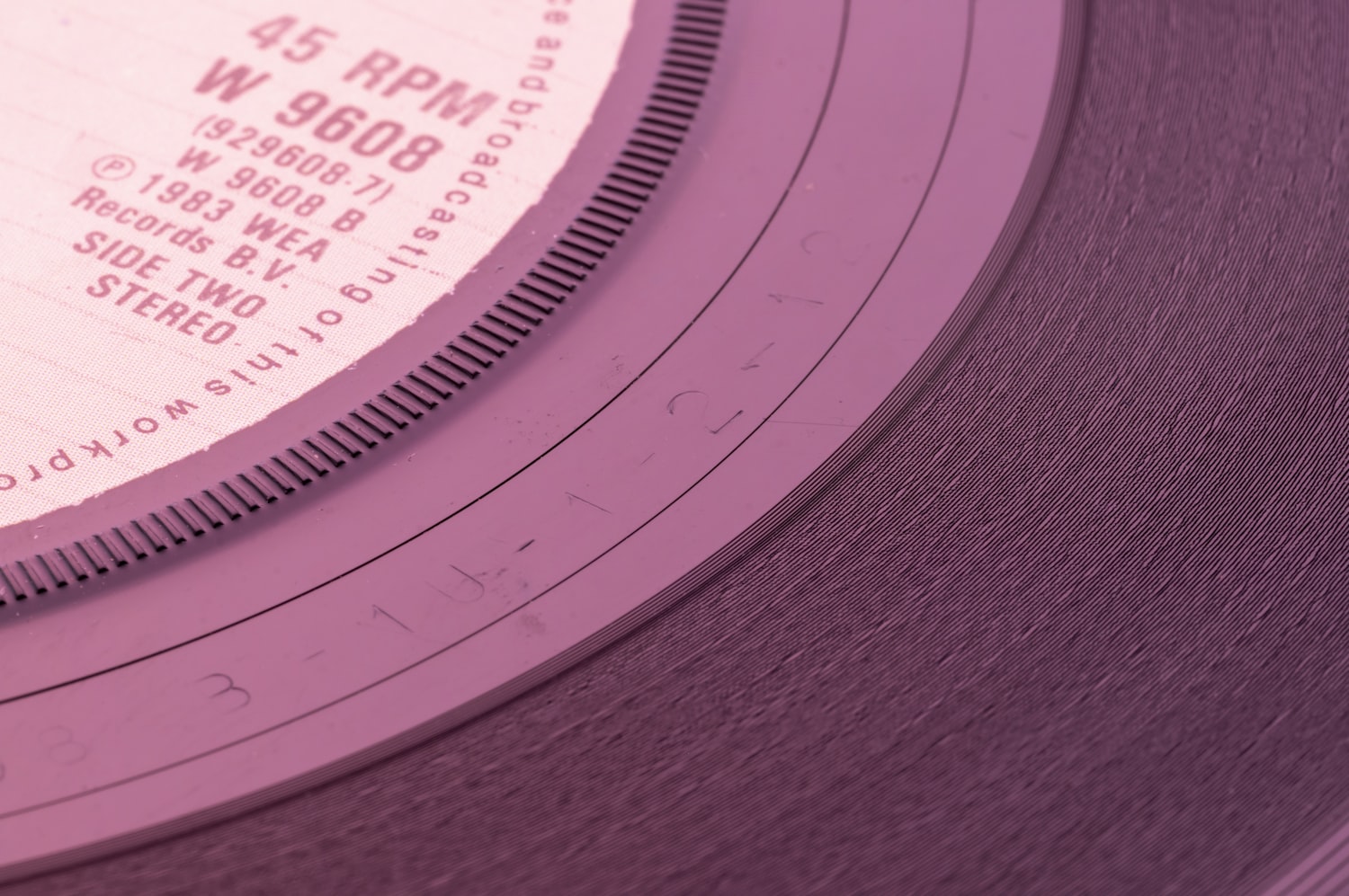 Close-up of a record label reading Side Two, pressed 1983